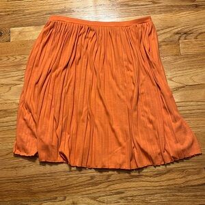 Uniqlo orange lined pleated skirt- size large
